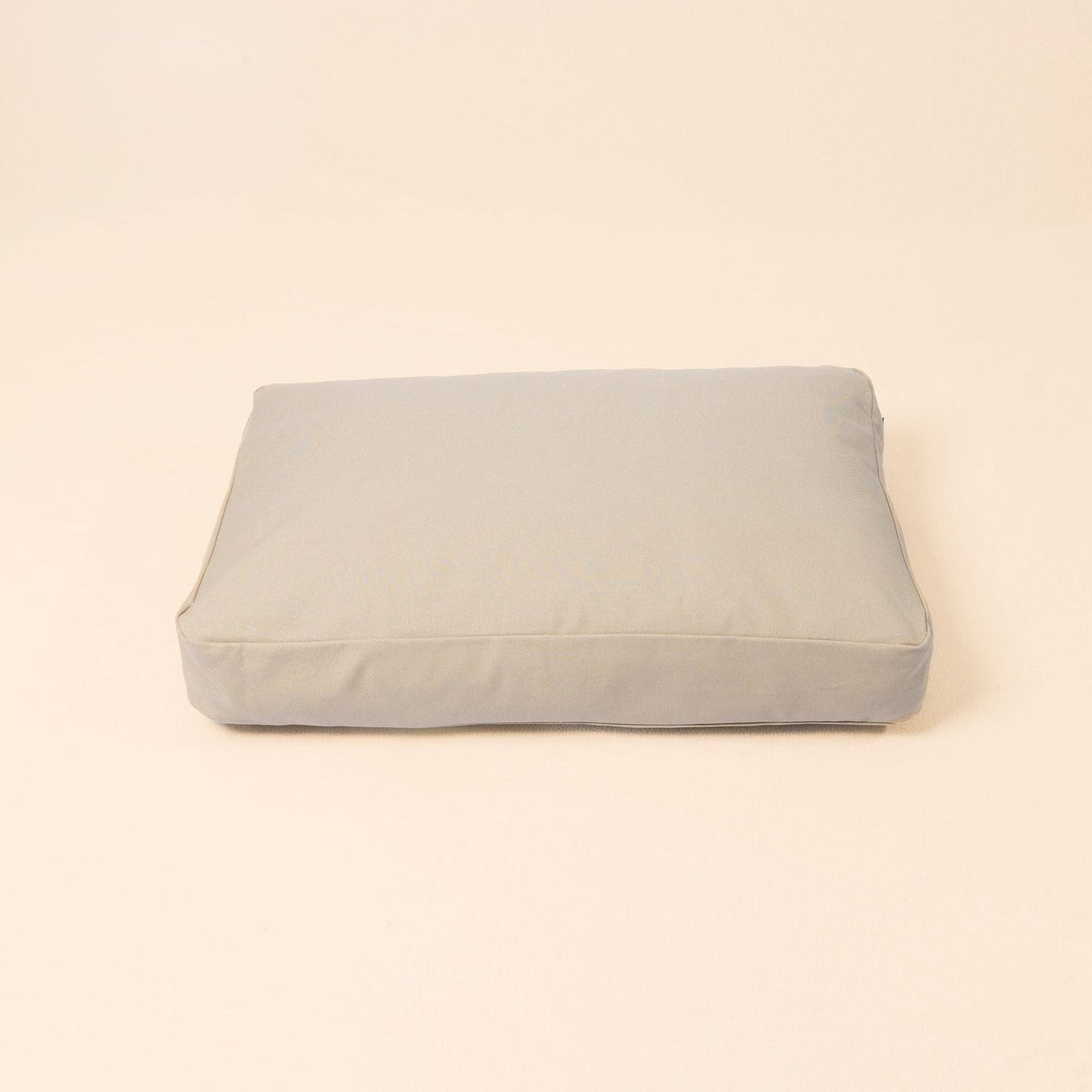 Natural wool dog bed in Driftwood color with organic cotton canvas cover and latex filling