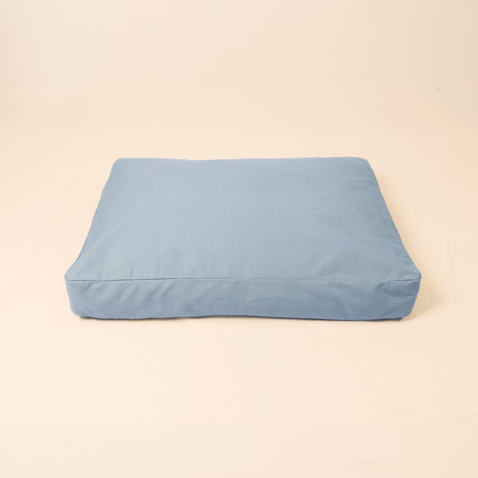 Natural wool dog bed in Lake color with organic cotton canvas cover and latex filling