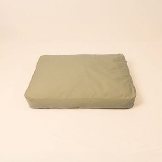 Natural wool dog bed in Moss color with organic cotton canvas cover and latex filling