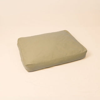 Natural wool dog bed in Moss color with organic cotton canvas cover and latex filling