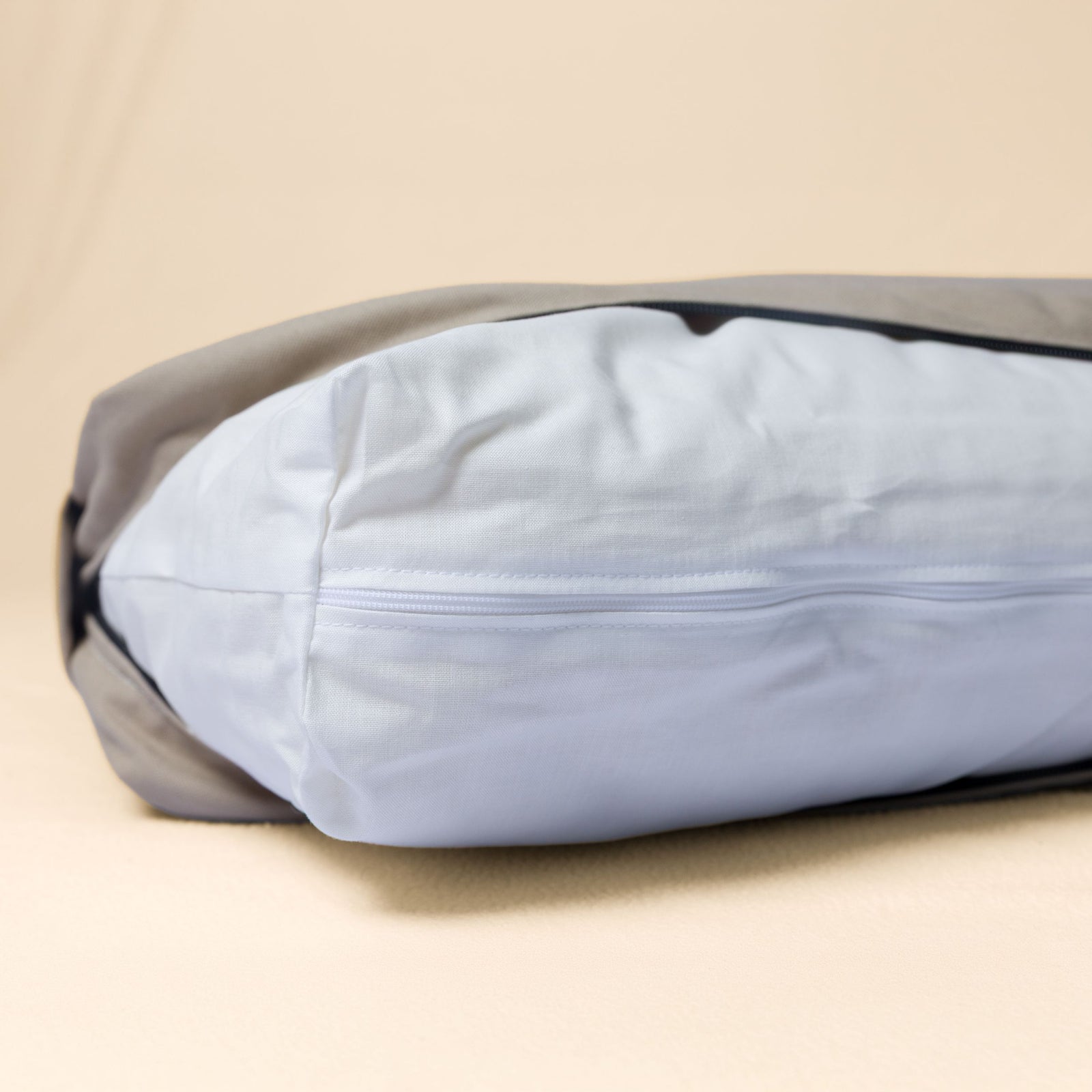 The Classic Bed with the cover pulled back to reveal the removable natural bed insert