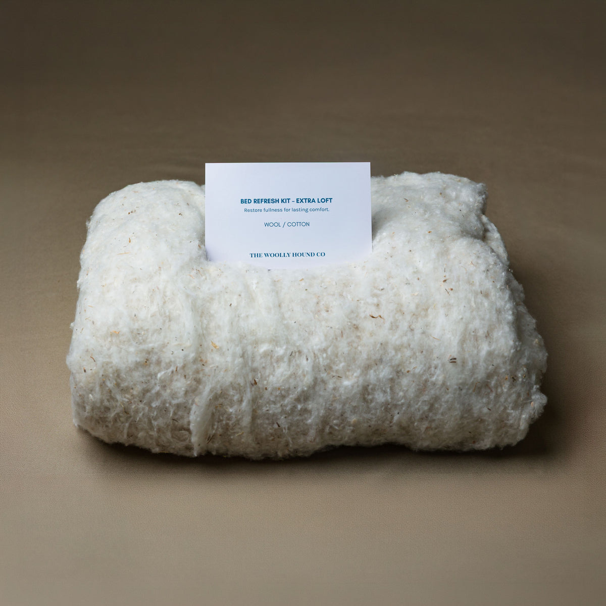 Cotton Bed Refresh Kit with natural cotton batting and instruction card.