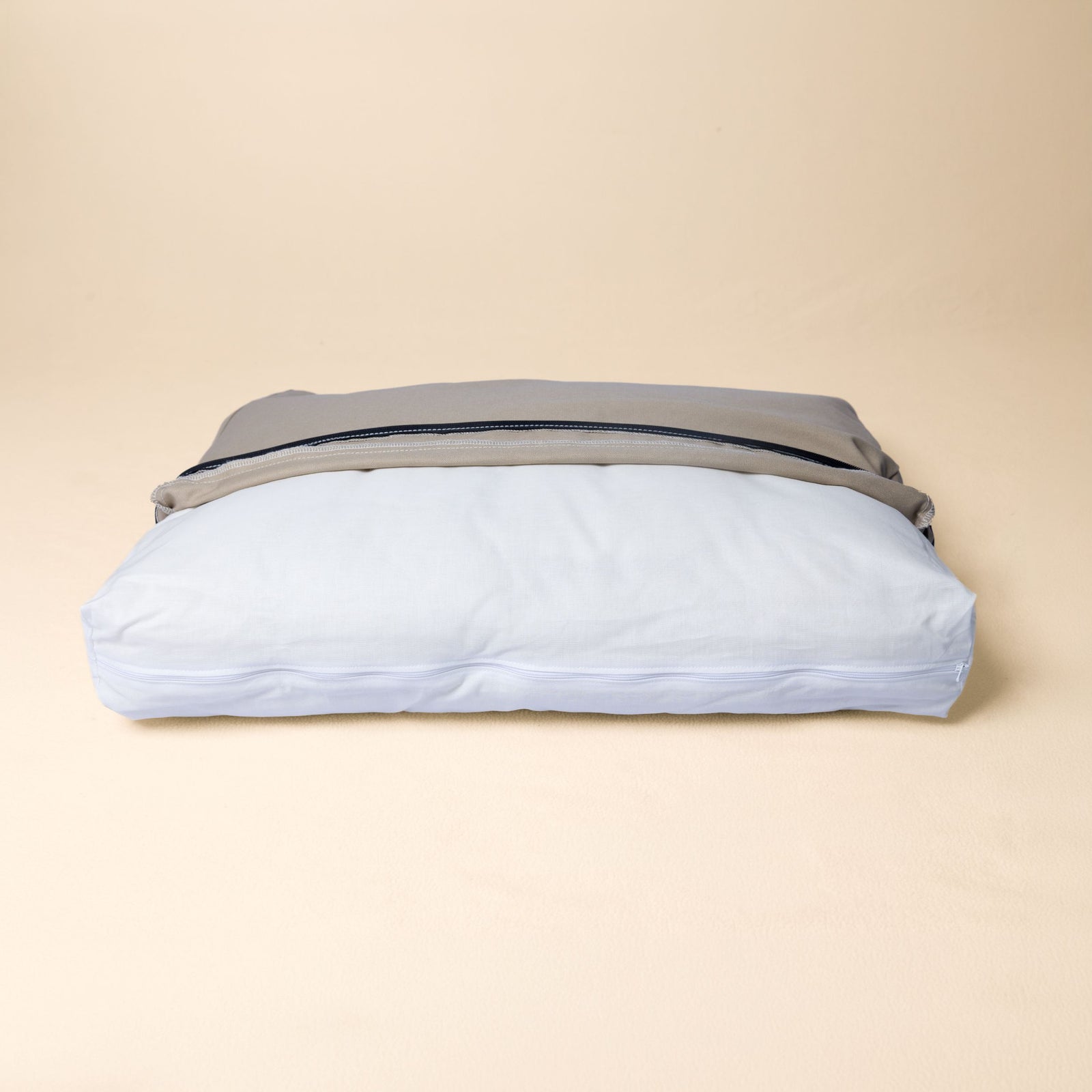 The Classic Bed with the cover pulled back to reveal the removable natural bed insert